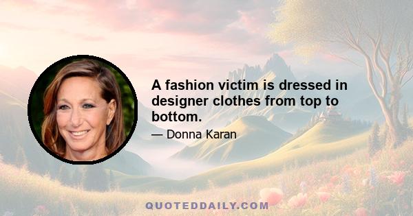 A fashion victim is dressed in designer clothes from top to bottom.